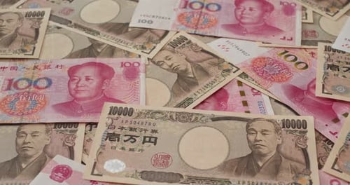 Colorful Currency with Yen and Yuan Banknotes