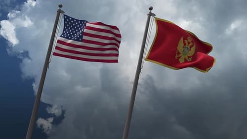 Flags of United States and Montenegro Waving in Cloudy Sky