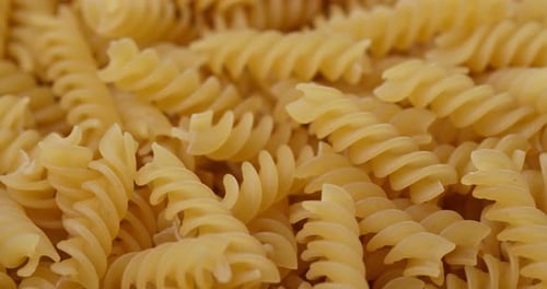 Dry uncooked fusilli close up