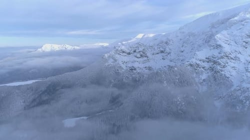 Foggy Valley in Winter Mountain