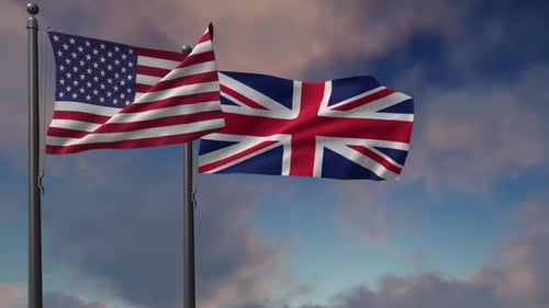 United States and United Kingdom Flags Waving Against Cloudy Sky