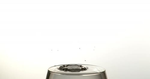 Water Drop Impacting on Top of Glass