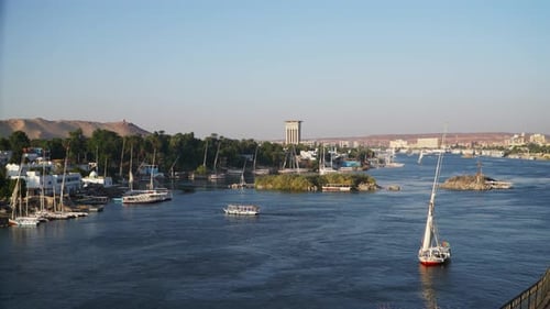 Beautiful Felucca Boats on Nile River Passing By Aswan