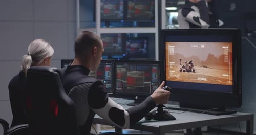 Team Controls Mars Rover in Futuristic Control Center