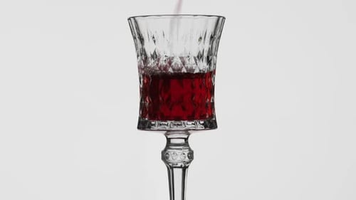 Wine Being Poured Into Diamond-Patterned Glass