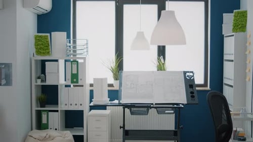 Nobody in Office with Blueprints Plans to Design Building Model for Architecture Project