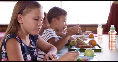 School kids having breakfast