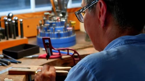 Craftswoman working in workshop