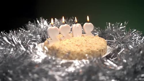 Festive Cake with Candles Celebrating 2022