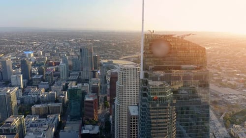 Cinematic urban aerial time lapse of downtown Los Angeles skyline.