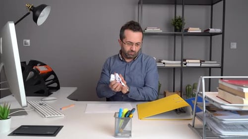 Document crumpling, office worker.