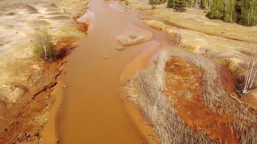 Orange Soil is Contaminated with Heavy Metals From an Industrial Plant
