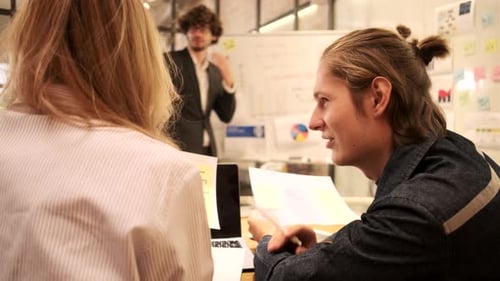 Team Brainstorming During Meeting in Office Environment