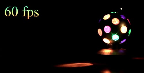 Disco Ball Rotating and Reflecting Lights in Dark