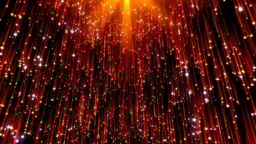 Sparkling Gold Particles Falling with Bright Red Light Rays