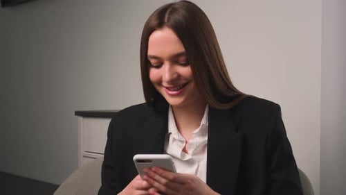 Portrait of Smiling Attractive Young Woman Using Phone for Online Shopping in Social Media Happy
