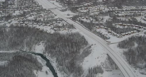 Helicopter aerial shot moving forward over green hills, day
