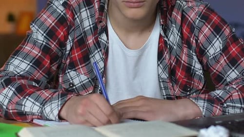 Irritated School Pupil Crumpling Notebook Paper and Throwing Away, Difficulties