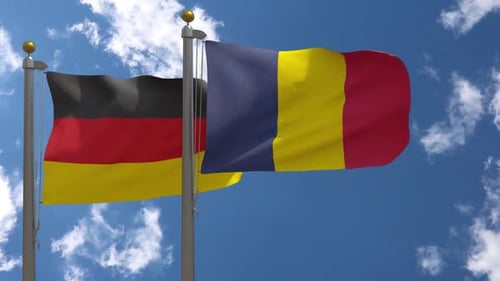 Waving Flags of Germany and Romania on Flagpoles