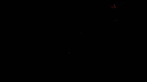 Dynamic Fireworks Exploding Against the Black Night Sky