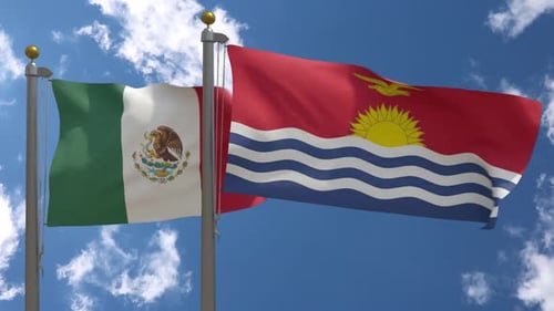 Mexico and Kiribati National Flags Waving on Flagpoles