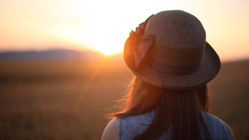 Girl Looking Ahead in the Field 2
