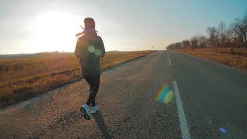 Young Fitness Woman Runner Athlete Running at Road