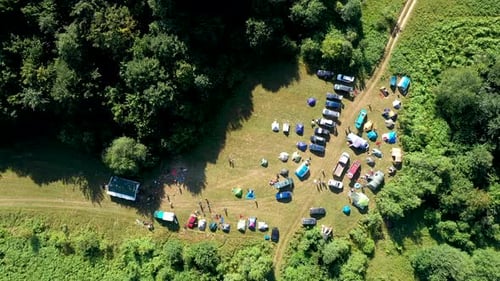 Flying Above a Camp With Tents in the Outdoors