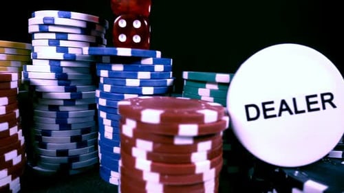 Casino Poker Chips and Dice on Table