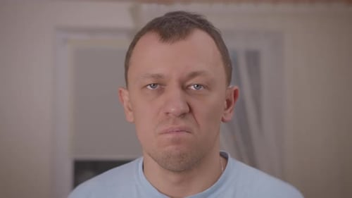 Close-Up of a Man with a Serious Expression