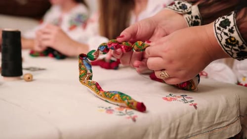 A Group of Girls Make Jewelry From Shawls Handmade Needlework Circle