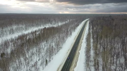 Car On The Road At Stormy Weather