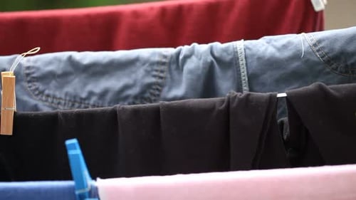 Clothes Hanging to Dry on Laundry Lline