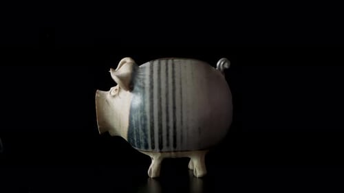 Bitcoin Coin Placed in Piggy Bank