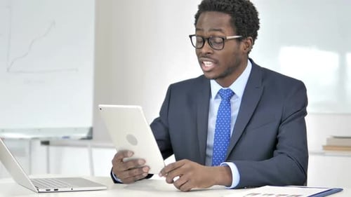 Young Adult Man on Tablet Video Call