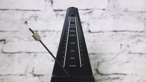 Antique Metronome with Pendulum in Slow Motion