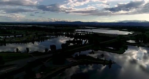 Glorious mountain sunset with reflections in lakes and ponds. Shot by drone from 185ft 4k 60fps