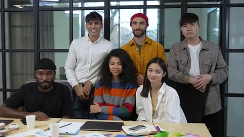 Multiethnic Coworkers Posing for Camera in Office