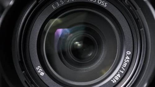 The Camera Lens Rotates Lights Reflecting Off Glass Robotic Camera Movement