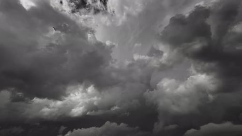 Monochrome Clouds Billow Across Ominous Sky