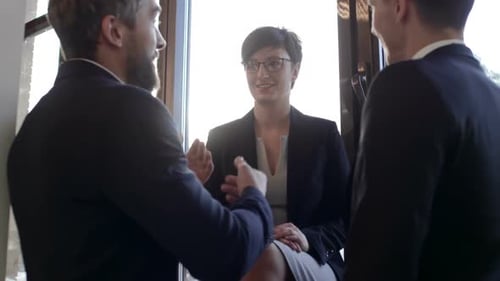 Office Workers Speaking and Explaining Something