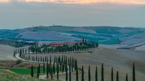 Sunrise time lapse of Tuscany landscape in Italy