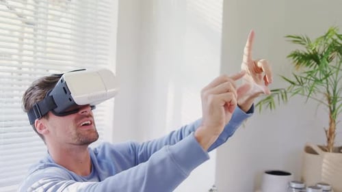 Man Experiences Virtual Reality in Bright Home