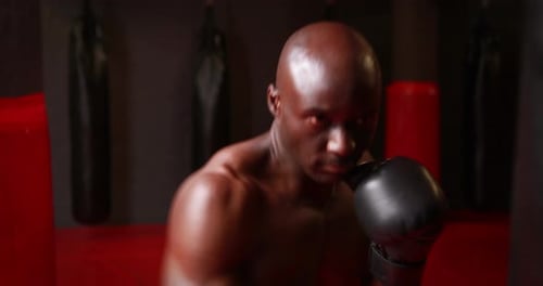 Man boxing at crossfit gym