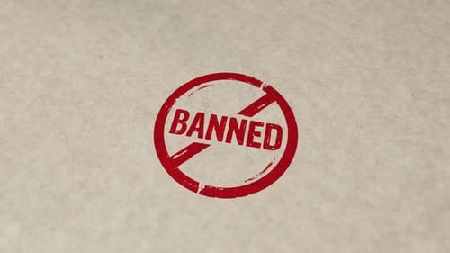 Banned Rubber Stamp Reveal on Paper Texture