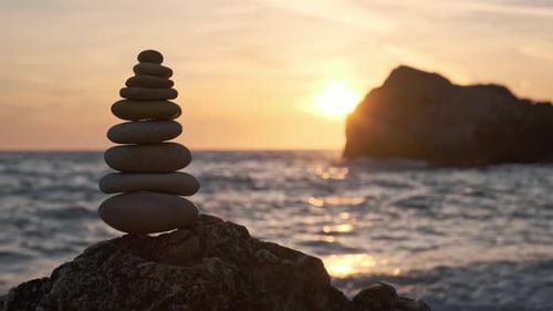 Concept of Balance and Harmony - Stone Stacks on the Beach