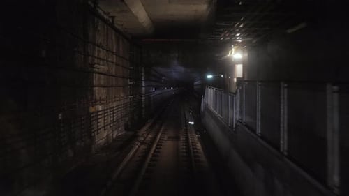 Subway Train Running Through the Tunnel. Train Traveling Through the Underground Tunnel, View From