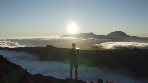 Aerial view of a person standing on the mountain, Reunion.