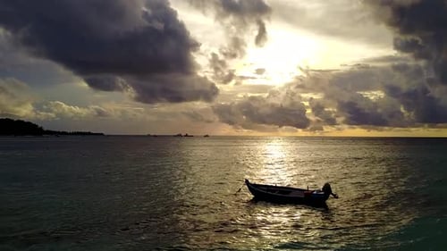 Aerial drone scenery of tropical shore beach by blue water and sand background