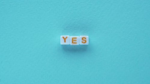 Close Up of "Yes" Spelled Out in Letter Tiles